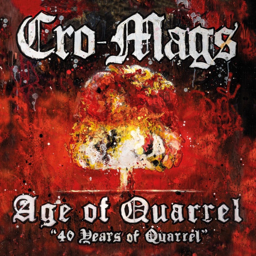 Portada d'«Age of Quarrel: 40 Years of Quarrel», dels Cro-Mags: un bolet atòmic pintat en groc i blanc sobre un fons vermell, amb el nom del grup en lletra gòtica