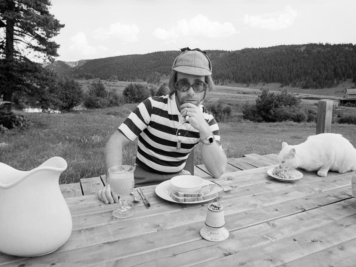 Elton John around the time of “Rock of the Westies”, in the image used for the fiftieth anniversary edition