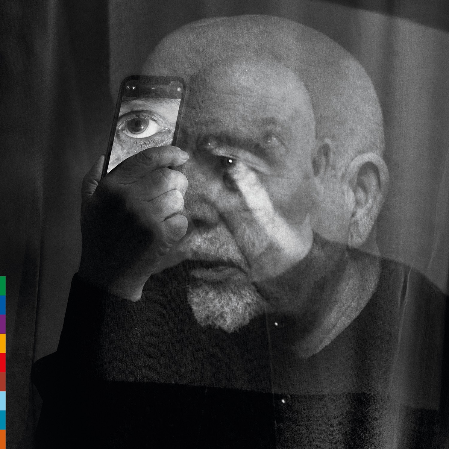 La portada d'«o\i», de Peter Gabriel, amb el títol compost per una lletra i una barra invertida