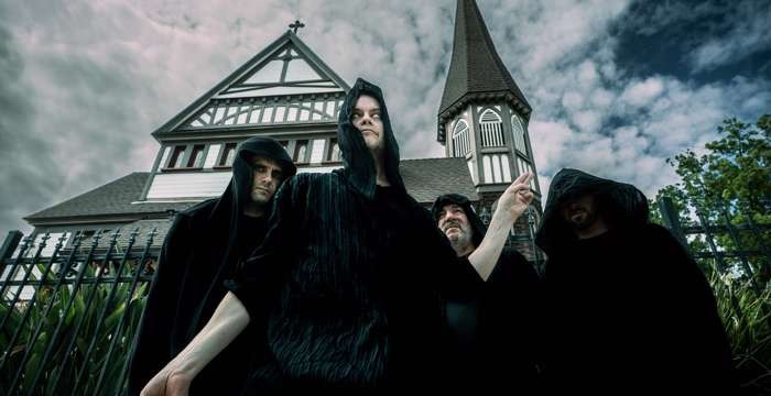 Satanic Planet, el grup de Lucien Greaves, Luke Henshaw, Justin Pearson i Dave Lombardo, a la fotografia de promoció de «Dead Deities»