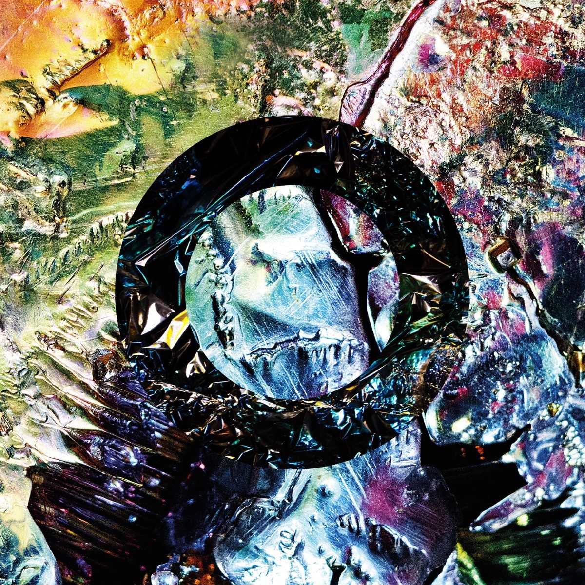 Portada d'«Exploding In Slow Motion: The Complete Channel The Spirits Recordings 2013-2017CE», de The Comet Is Coming